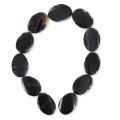 Cuenta Black Agate oliva plana retorcida 35x25 mm x1