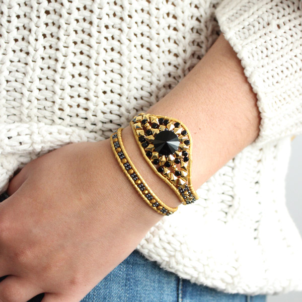 Botón de PureCrystal Diamonduo manguito Wrap Negro y Oro y Botón de PureCrystal Diamonduo manguito Wrap Negro y Oro y