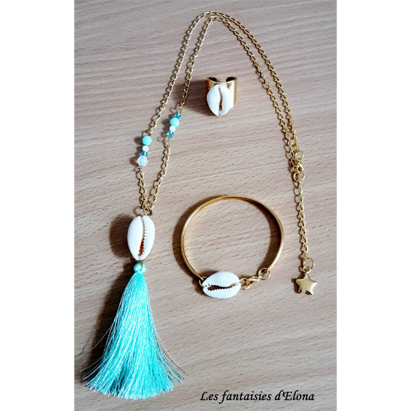 Conjunto concha y pompon Conjunto concha y pompon