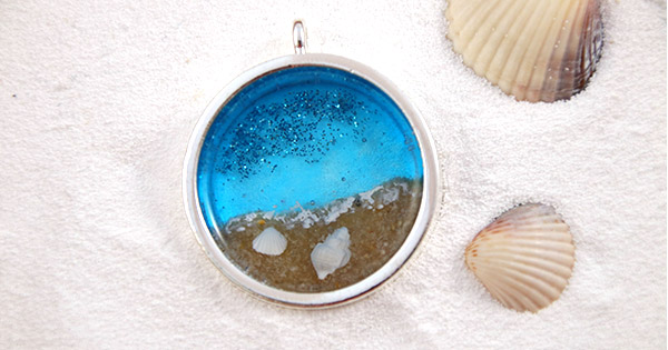 Colgante de resina UV led paisaje de mar.