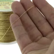 Hilo nilón trenzado metalizado 0.6 mm dorado x130 m