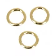 Anillas cerradas 7x1 mm dorado con oro fino x25
