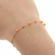 Cadena con cuentas facetadas de vidrio 2.95 mm Dorado satinado / Naranja x1m