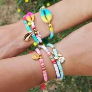 Concha Cauri degradado azul/amarillo para hacer joyas DIY - entre 20 y 26mm x1