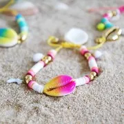 Concha Cauri degradado azul/amarillo para hacer joyas DIY - entre 20 y 26mm x1