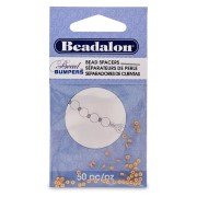 Separadores redondos Bumper 2 mm dorado satinado x50