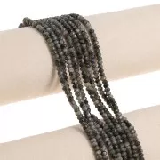 Redondas aplanadas facetadas 4x3 mm de Quartz teñida - Gris Oscuro x35cm