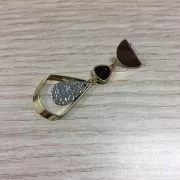 Entrepieza gota 2 anillas cristal facetado forma gota 14x9 mm Dorado/Granate x1