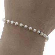 Cadena adornada de acero inox dorado con cuentas imitación nácar 4 mm - Blanco x1m