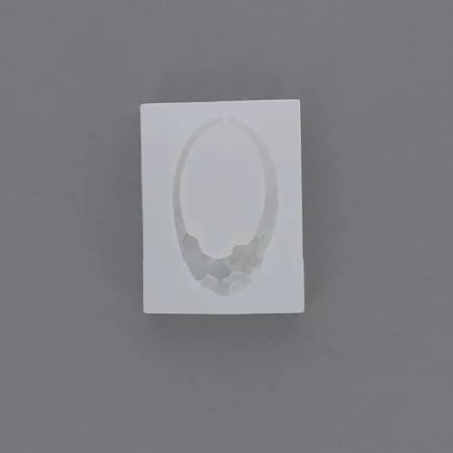 Molde silicono ovalado calado para hacer colgantes de resina 51x30 mm x1