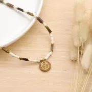 Colgante redondo plano 20 mm - escarabajo gravé exclu Perles & Co - Cornaline - Dorado x1