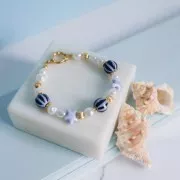 Cierre de reasa boya de 14 mm en acero inoxidable 304 dorado x1