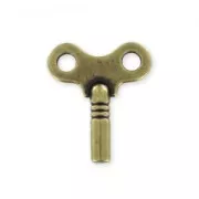 Dije Llave mariposa 22 mm bronce x1