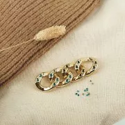 Eslabón acrílico ovalado retorcido 26x21 mm para cabujón 1088 1,8 mm - Plateado x1