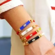 Cuenta de tubo curvado en resina epoxi y óxido de zirconio 33x8 mm con diseño de ojo - Oro - Blanco x1