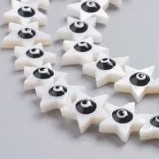 Cuenta de estrella de nácar 11x12 mm con diseño de ojo - Natural - Negra x1