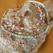 Cuenta de pez de nácar 16x8 mm con diseño de ojo - Natural - Azul x1