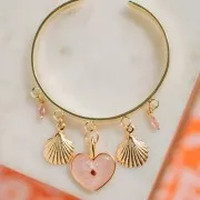 Colgante corazón 24x19 mm resina epoxi - Dorado oro fino - Perla azul cielo x1