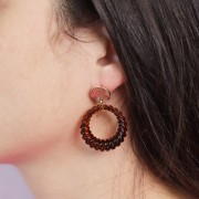 Colgante redondo hueco trenzado 29 mm en resina transparente - Ámbar jaspeado x1