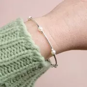 Perlas ovaladas de agua dulce 5x4 mm - Grado AA- Blancas x6