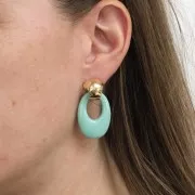 Colgante ovalado calado de resina opaca 33x23 mm - Marrón x1