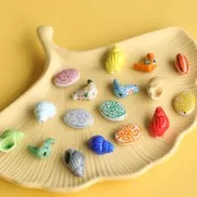 Cuenta de cerámica ovalada plana 19x14 mm - motivo azteca - Blanco - Rosa x1