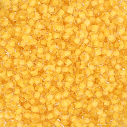 Cuentas de Rocalla Preciosa 11/0 de 2 mm - Crystal Yellow Lined x 20 g