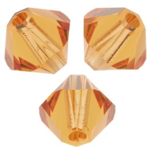 Peonzas de cristal Swarovski 5328 6 mm Topacio x20