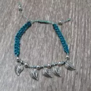 Dije hoja 13x7 mm Dorado con oro fino x1