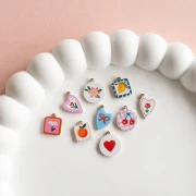 Dije de pez 12,5x10 mm con resina epoxi - Acero inoxidable 304L Dorado - Multicolor