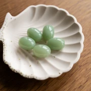 Cuenta con forma de oliva 21x15 mm en resina translúcida - Liquen jaspeado x1