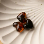 Cuenta corazón de resina transparente 15,5x18 mm - agujero horizontal - Ámbar jaspeado x1