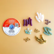 Mes bijoux DIY - Kit de 4 pulseras elásticas con cuentas tubulares - Versión dorada