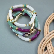 Mes bijoux DIY - Kit de 4 pulseras elásticas con cuentas tubulares - Versión dorada