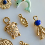 Dije de mano 15x5,5 mm motivo ojo y strass - Acero inoxidable 304 Dorado x1