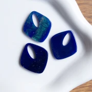 Colgante acrílico diamante hueco 28x25 mm - Azul medianoche jaspeado purpurina x1