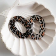 Colgante Hueco Ovalado de Acetato 47x34 mm - Leopardo Negro Purpurina - Naranja x1