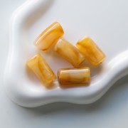 Cuentas de tubo curvado 29x14 mm en acrílico translúcido - Ámbar jaspeado - Blanco x10