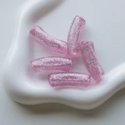 Cuentas tubo curvado 35x11 mm en acrílico transparente - Rosa Glitter Plateado x6