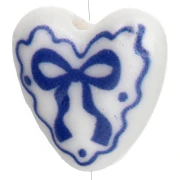 Cuenta de cerámica corazón 15x14,5 mm - motivo lazo - Blanco - Azul x1
