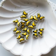 Cuentas de vidrio mariposa 14x10 mm - Amarillo - Negro x1