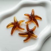 Perla acrílica estrella de mar 37x43 mm - Marrón x1