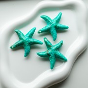 Colgante acrílico estrella de mar 49x45 mm - Turquesa - Marrón jaspeado x1