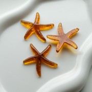 Colgante estrella de mar 37x38 mm resina - Caramelo x1