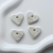 Colgante de cerámica en forma de corazón, 21 x 23 mm - Efecto marmolado marfil x1
