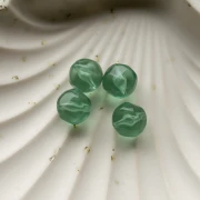 Cuentas redondas irregulares facetadas de 12 mm de resina transparente - Verde musgo x4