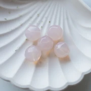 Cuentas facetadas redondas irregulares de 14 mm en resina transparente - Rosa pálido
