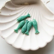 Separador de peces 27x9 mm en resina - Verde turquesa x1