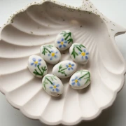 Cuenta cerámica oval 19x14,5 mm - motivo flor - Blanco - Azul - Verde x1