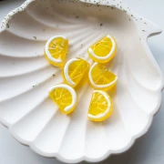 Cuenta rodaja de limón 18x13 mm en vidrio - Amarillo - Blanco x1